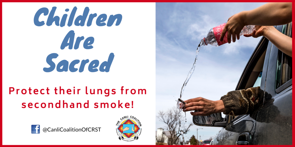 banner that says, "Children are sacred. Protect their lungs from secondhand smoke!"